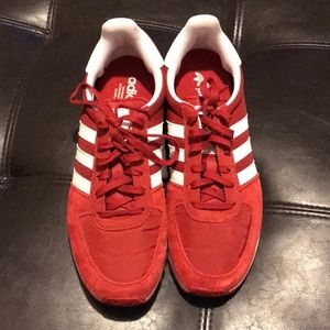 Red Adidas sneakers